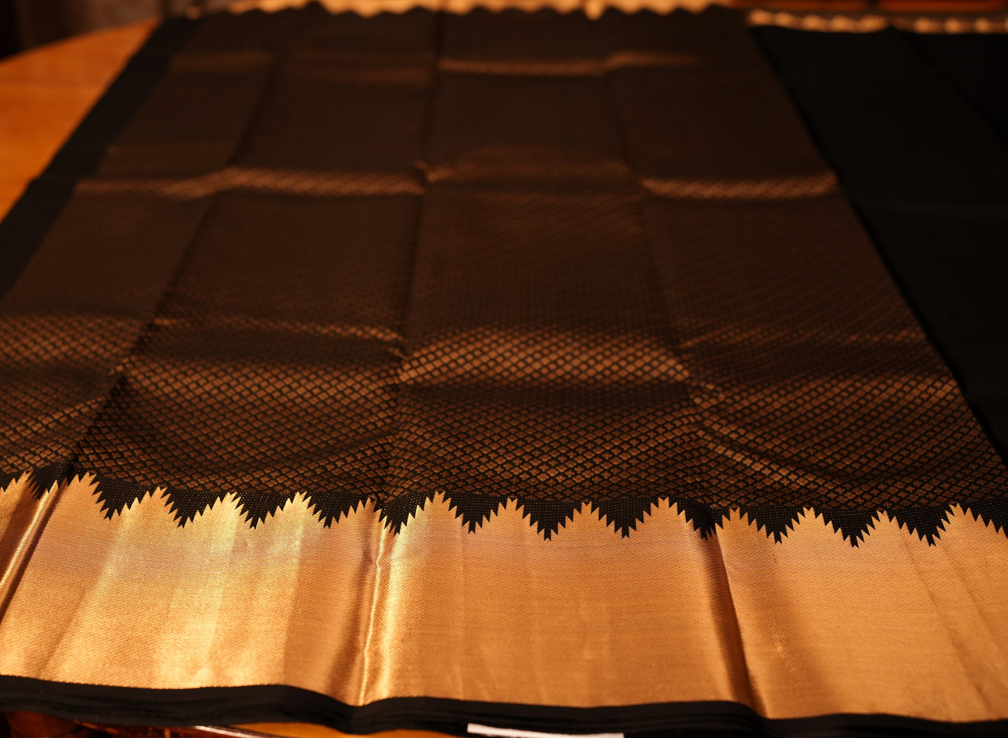 BLACK TEMPLE BORDER KANCHIPURAM SILK SAREE